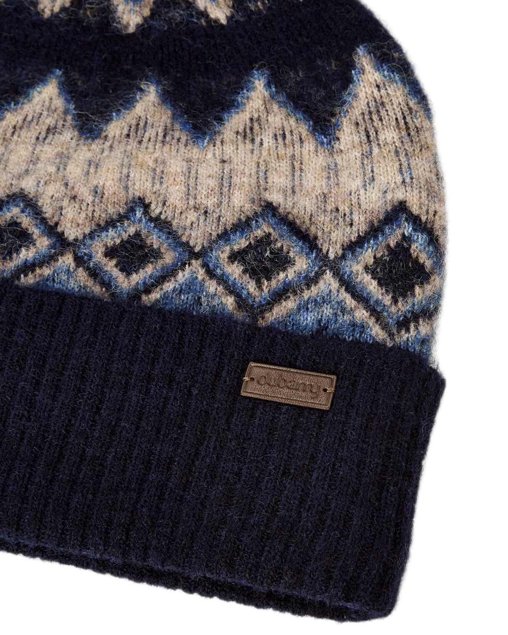 Navy Multi coloured Dubarry Coolroe Knitted Bobble Hat on white background 