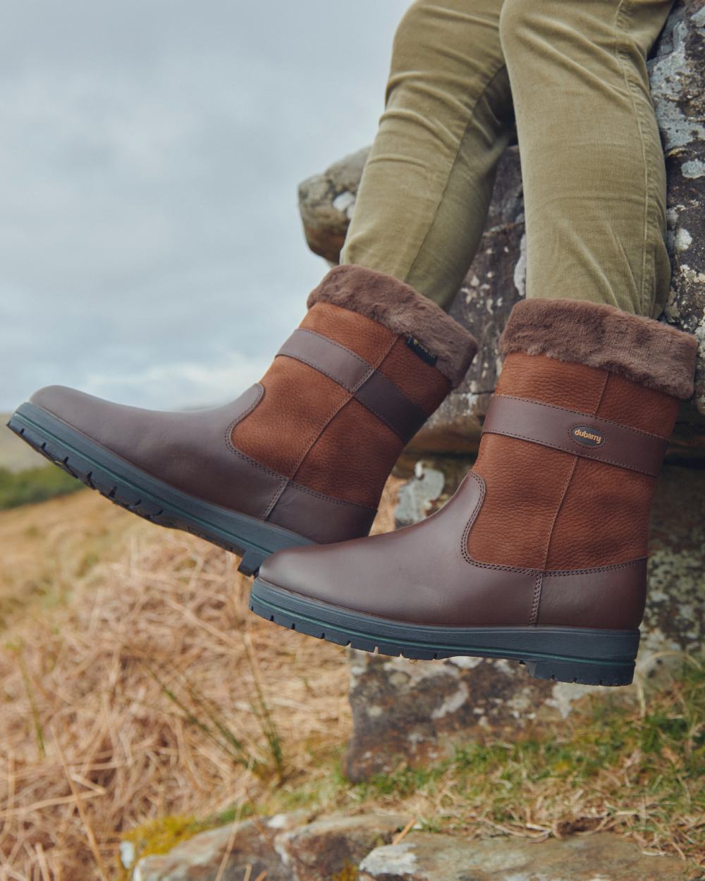 Walnut coloured Dubarry Foxrock Country Boot on grass background 