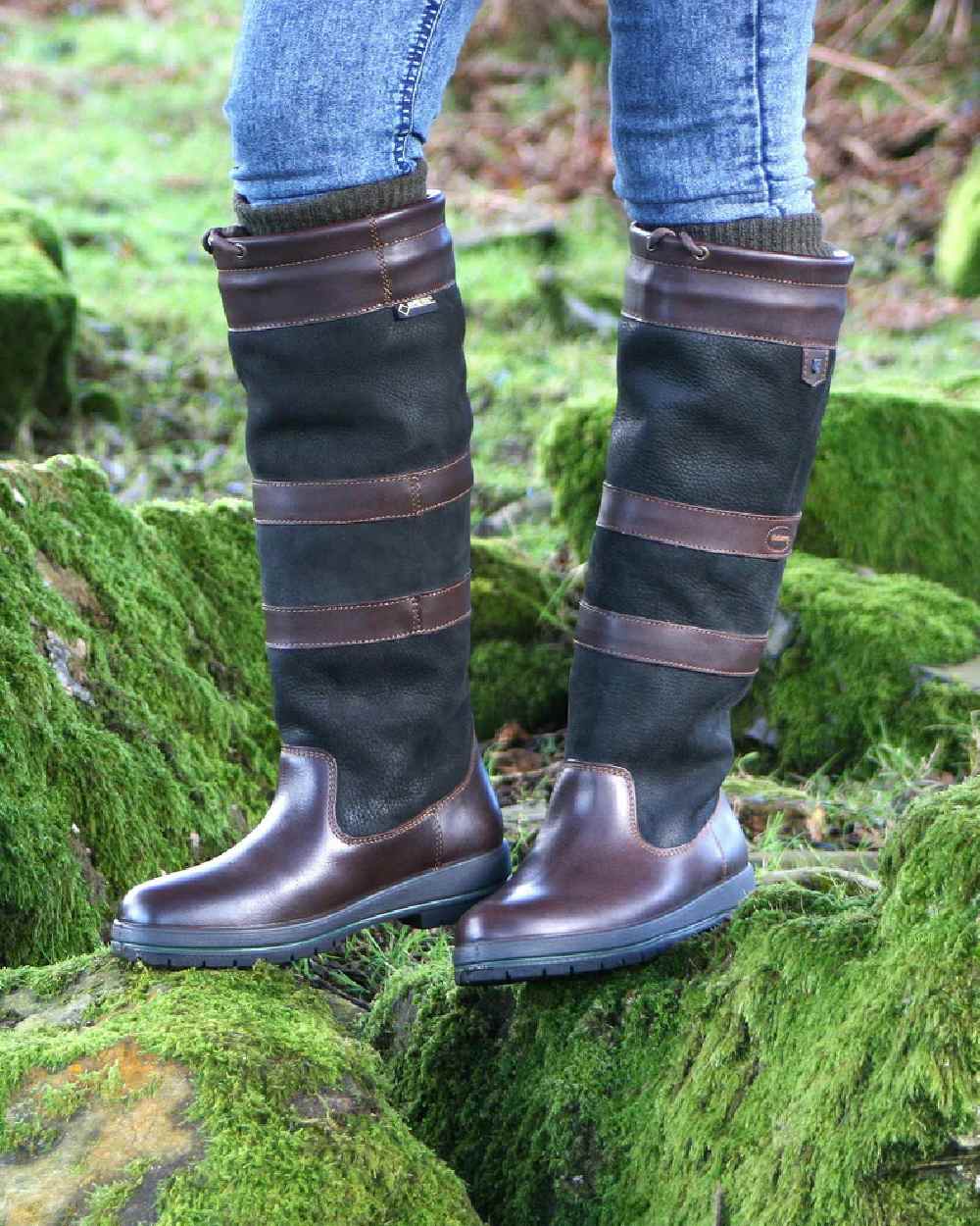 Black Brown coloured Dubarry Galway Country Boots on grass background 