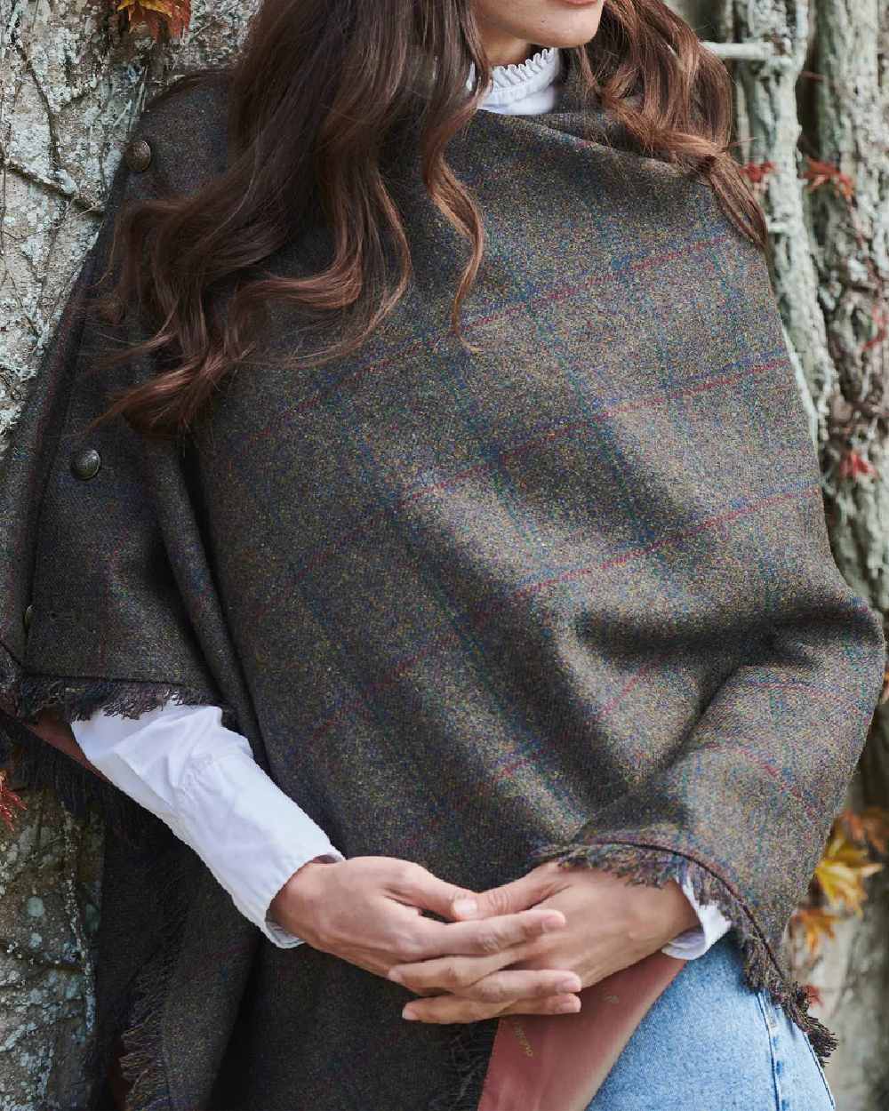 Hemlock Coloured Dubarry Hazelwood Tweed Poncho on tree background 