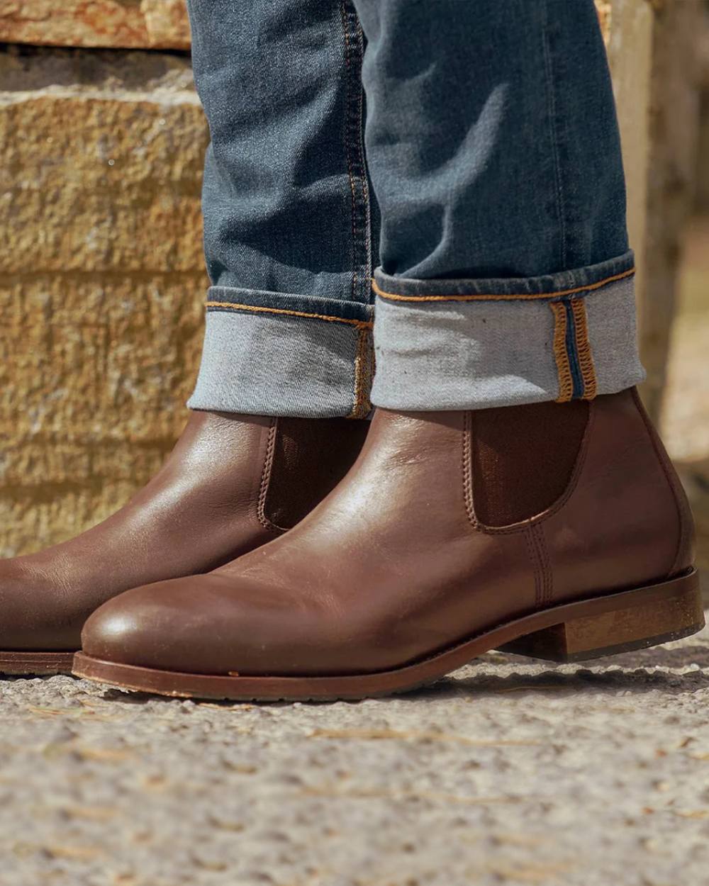 Mahogany coloured Dubarry Kerry Leather Soled Boots on blurry background 