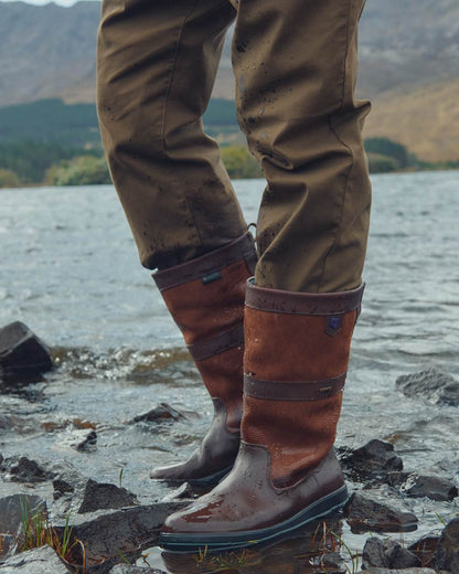 Walnut coloured Dubarry Kildare Country Boots on sea background 