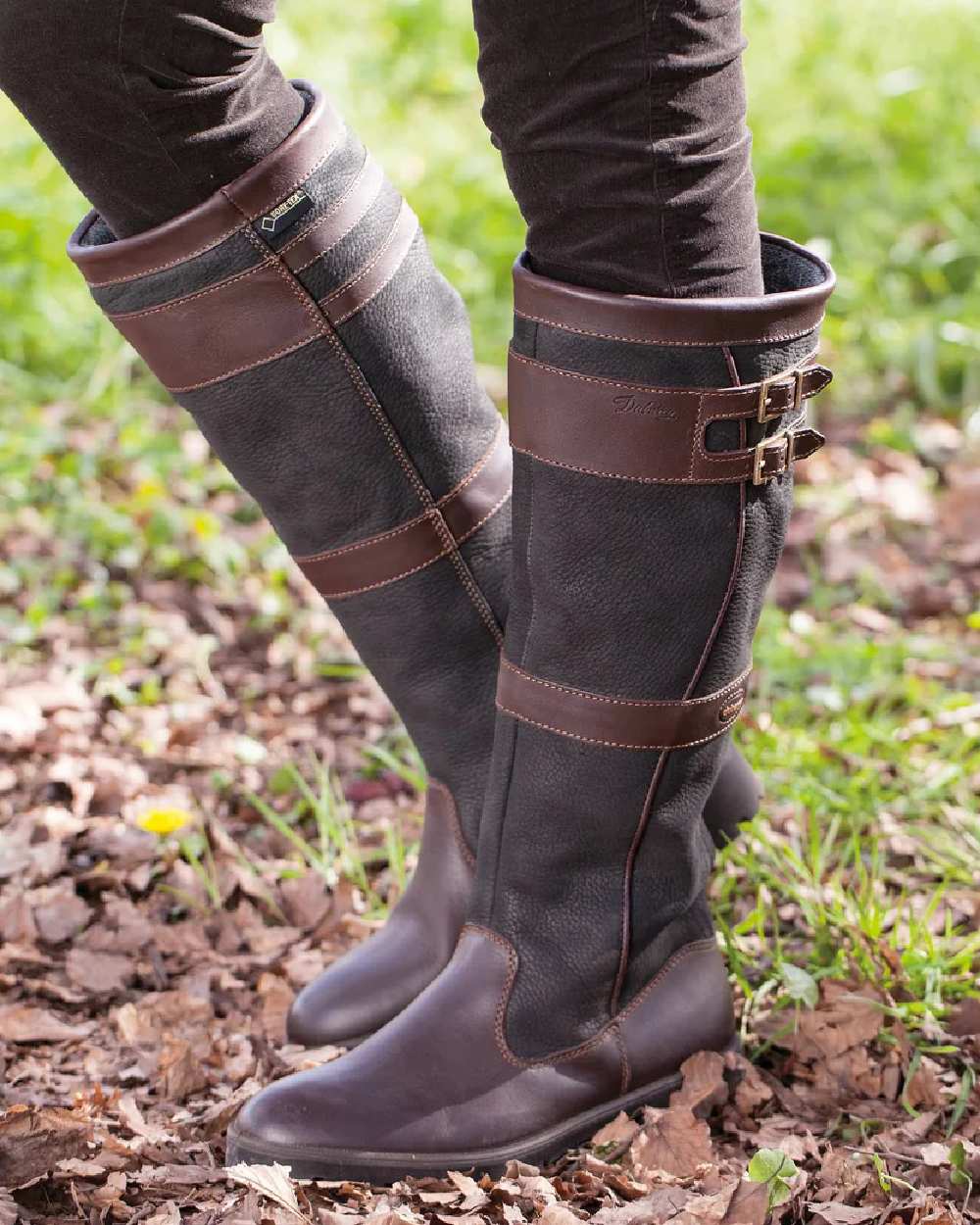 Black Brown coloured Dubarry Longford Country Boots on ground background 