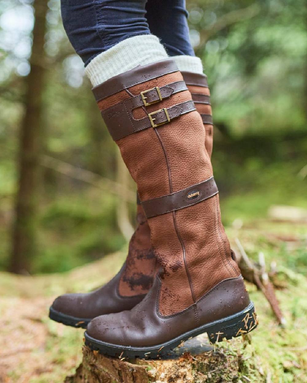 Walnut coloured Dubarry Longford Country Boots on wood background 