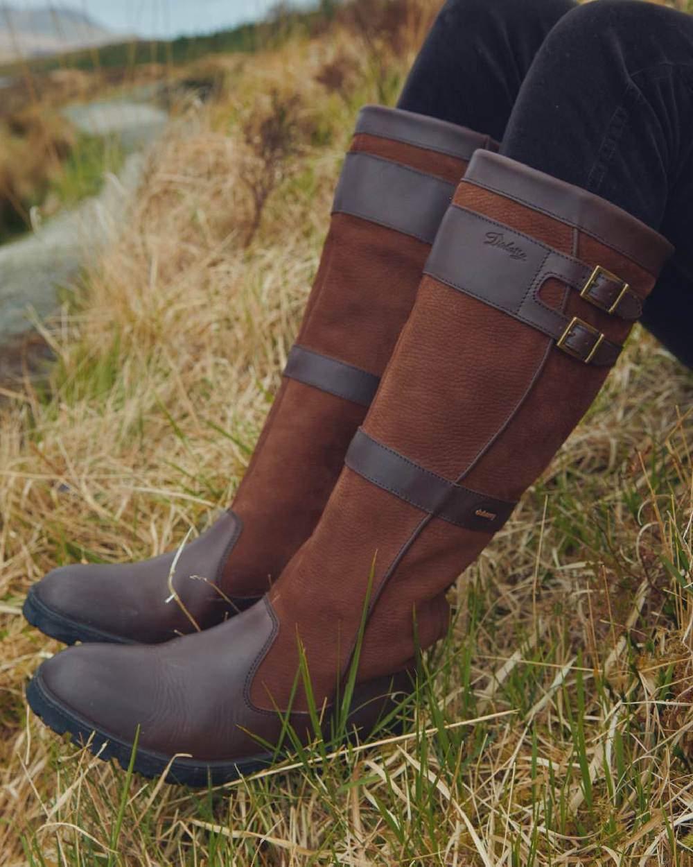 Walnut coloured Dubarry Longford Country Boots on grass background 