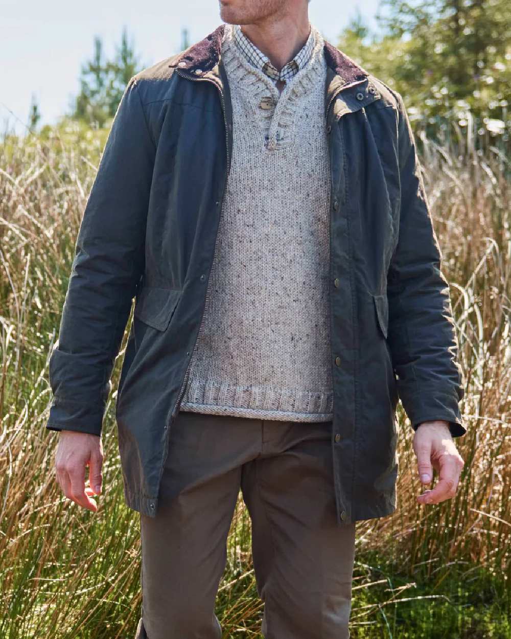 Olive Coloured Dubarry Mens Chalkhill Wax Jacket on outdoor background 