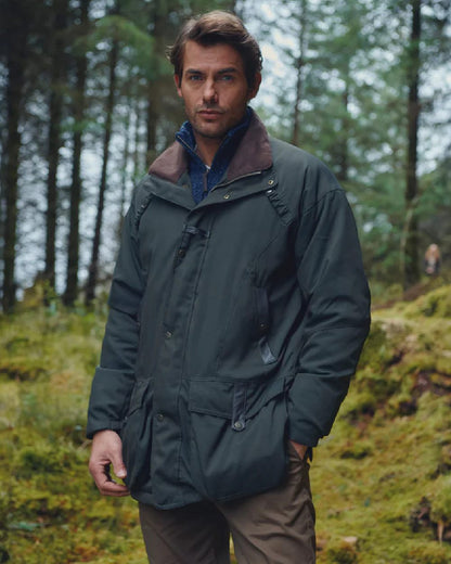 Olive Coloured Dubarry Mens Longacre Waterproof Jacket on outdoor background 