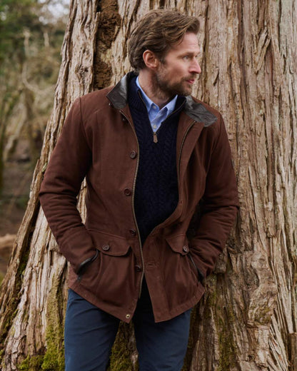 Walnut coloured Dubarry Mens Moore Leather Jacket on forest background 