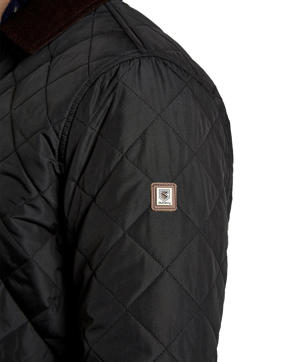 Black coloured Dubarry Mountusher Quilted Jacket on white background 