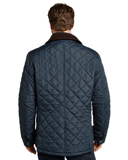 Navy coloured Dubarry Mountusher Quilted Jacket on white background 