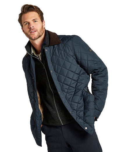 Navy coloured Dubarry Mountusher Quilted Jacket on white background 