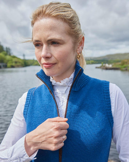 Peacock Blue Coloured Dubarry Sheedy Knit Bodywarmer on outdoor background 