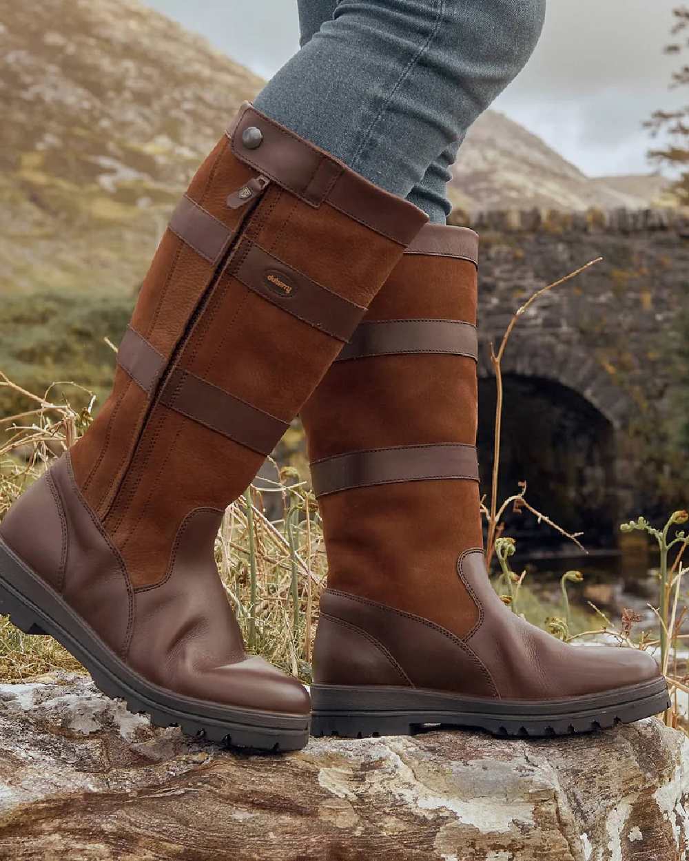 Walnut coloured Dubarry Wexford Country Boots on rock background 