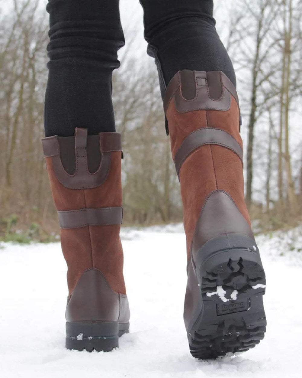 Walnut Coloured Dubarry Womens Donegal Country Boots on snow background 