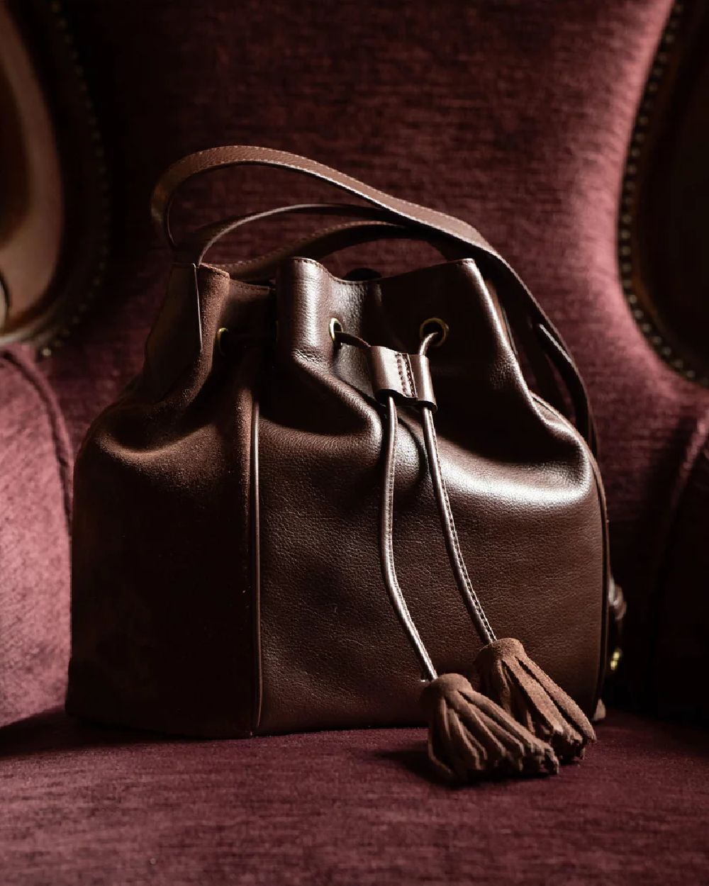 Cedar Coloured Dubarry Womens Doonbeg Cross Body Bucket Bag on outdoor background 