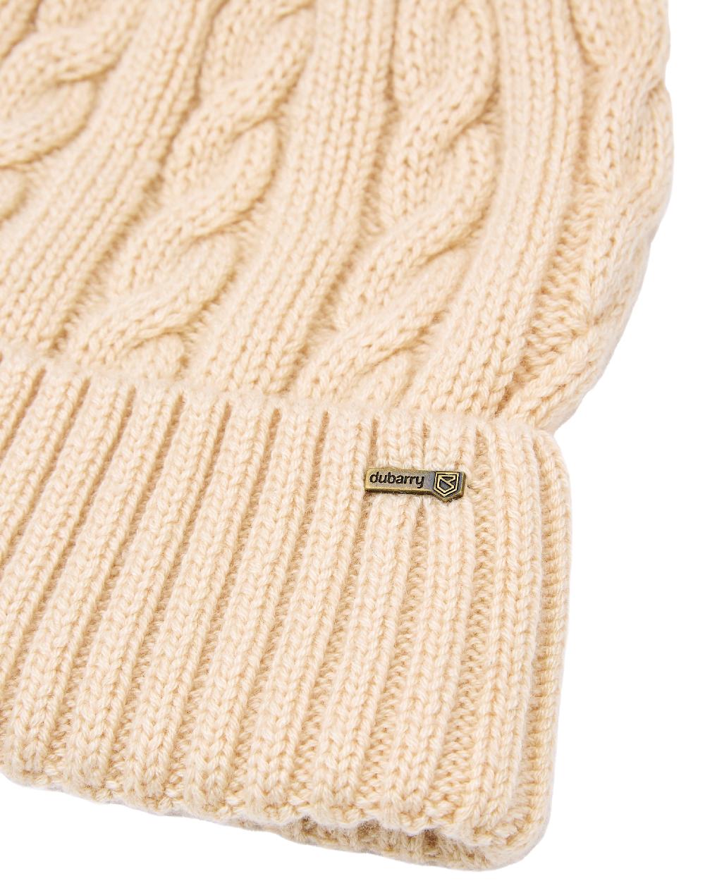 Chalk Coloured Dubarry Womens Forester Knitted Bobble Hat on white background 