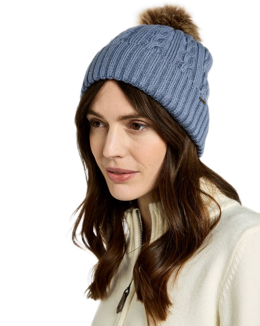 Indigo Coloured Dubarry Womens Forester Knitted Bobble Hat on white background 