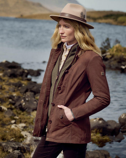 Walnut coloured Dubarry Womens Joyce Leather Jacket on water background 