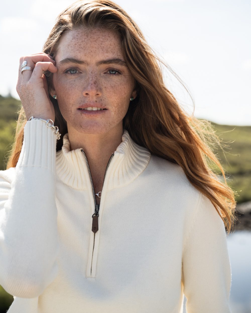 Chalk Coloured Dubarry Womens Markham Zip Neck Sweater on outdoor background 