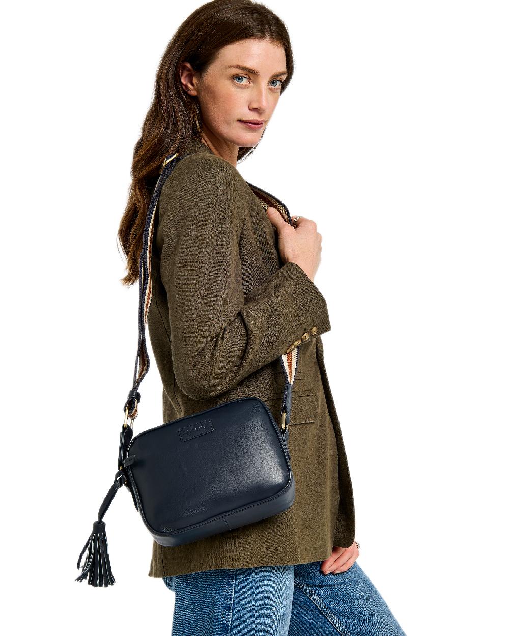 Navy Coloured Dubarry Womens Rostrevor Cross Body Bag on outdoor background 