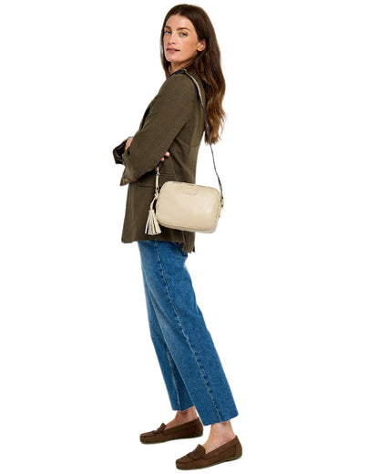 Oyster Coloured Dubarry Womens Rostrevor Cross Body Bag on outdoor background 