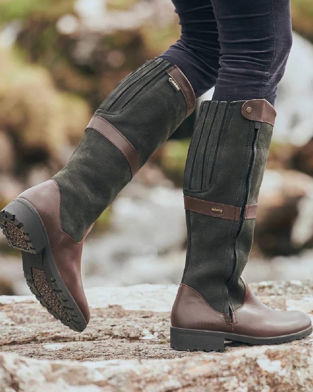 Black Brown coloured Dubarry Womens Sligo Country Boots on rock background 