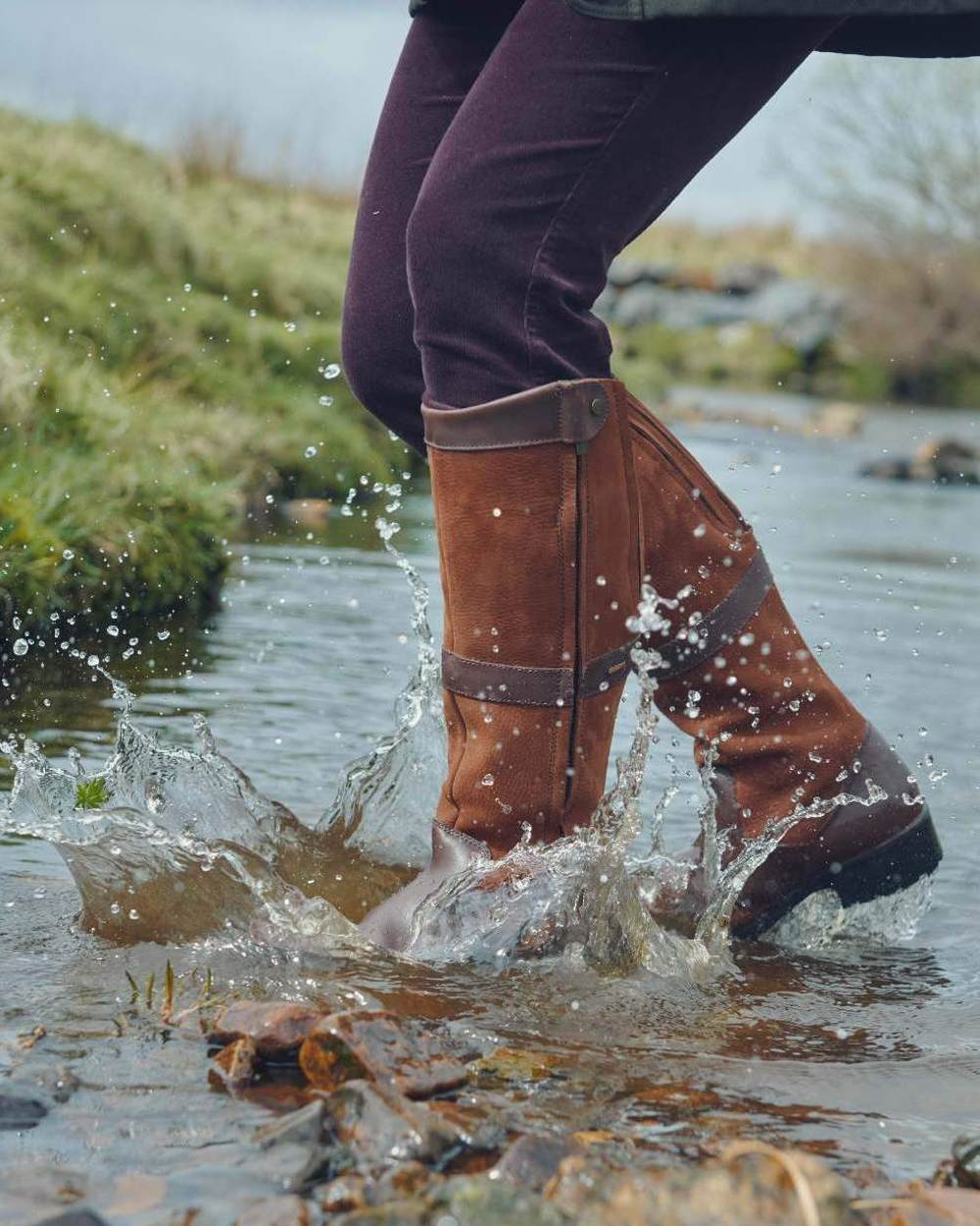 Walnut coloured Dubarry Womens Sligo Country Boots on water background 