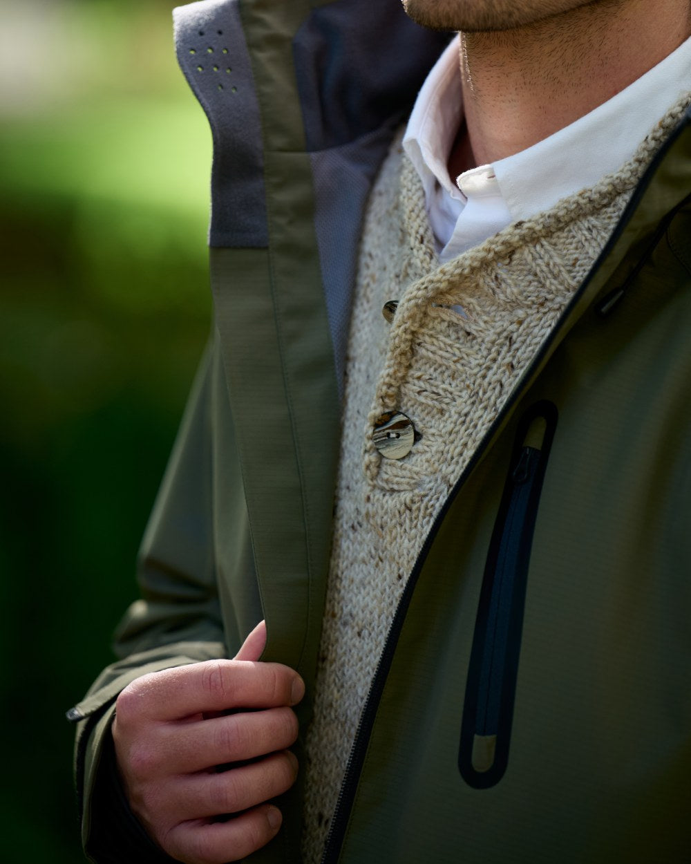 Kelp coloured Dubarry Mens Crossbarry Waterproof Jacket on outdoor background 