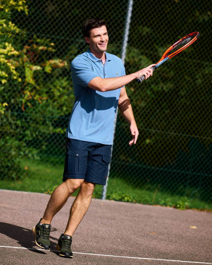 Indigo Coloured Dubarry Mens Morrison Polo Shirt on court background 