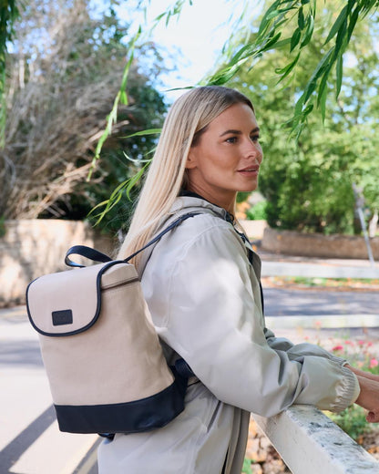 Navy coloured Dubarry Womens Rosegreen Canvas Backpack on park background 