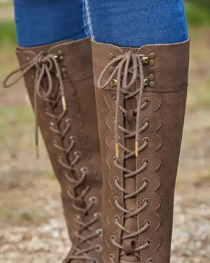 Chocolate coloured Dublin Admiral Boots on grassy background 