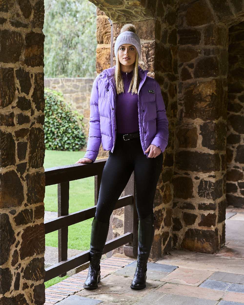 Purple Marle coloured Dublin Bea Beanie on stone wall background 