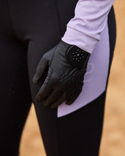 Black Coloured Dublin Everyday Bling Riding Gloves on blurry background 