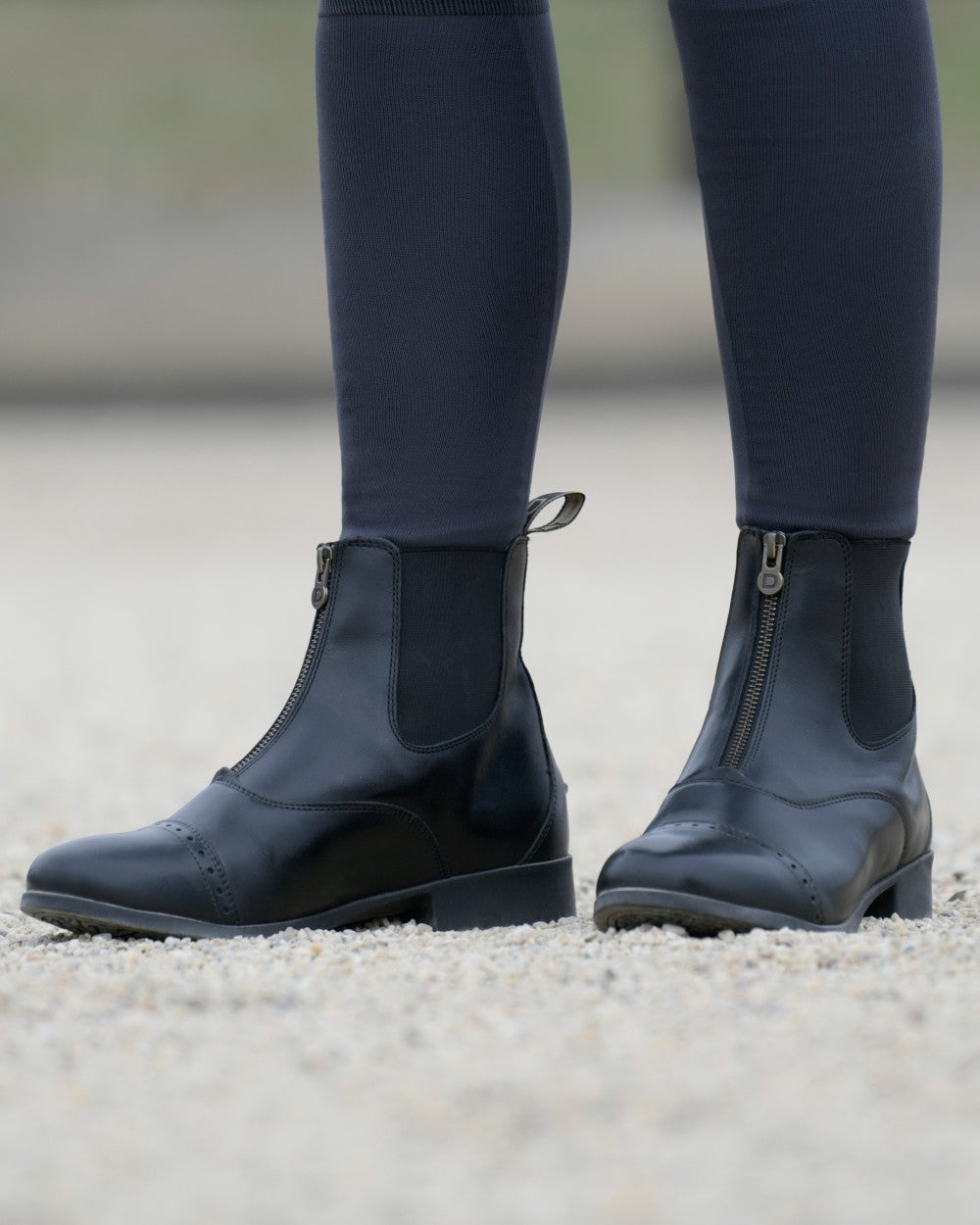 Black Coloured Dublin Foundation Zip Paddock Boots II on street background 