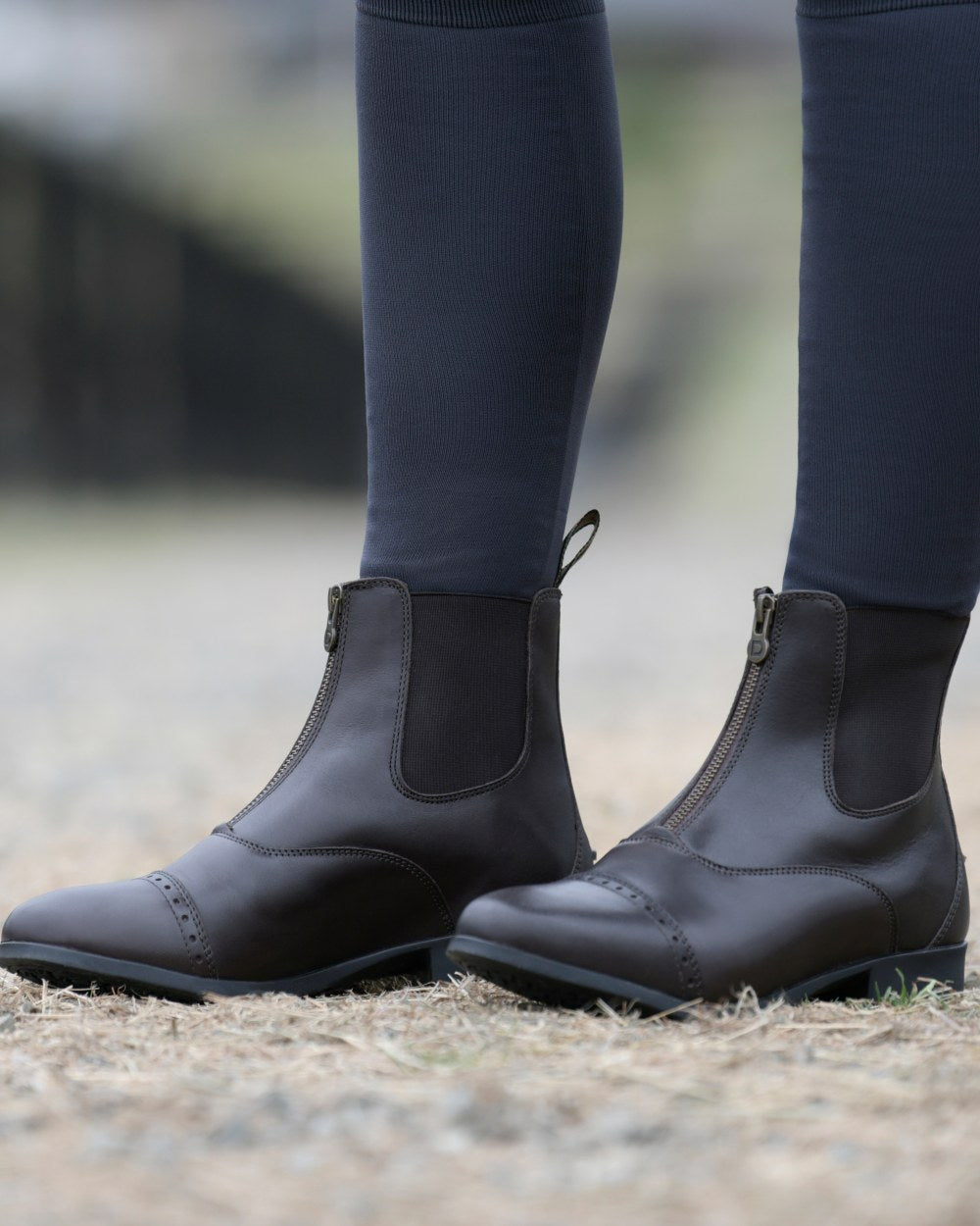Brown Coloured Dublin Foundation Zip Paddock Boots II on street background 