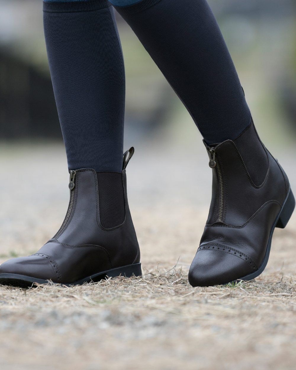 Brown Coloured Dublin Foundation Zip Paddock Boots II on street background 