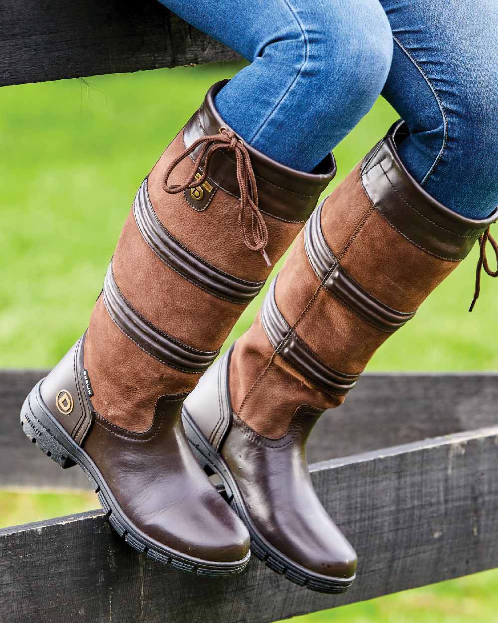 Brown coloured Dublin Husk Boots II on fence background 