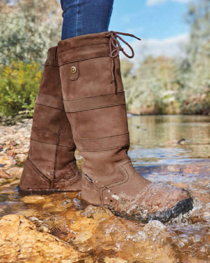 Chocolate coloured Dublin River Boots III on water background 