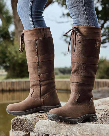 Chocolate coloured Dublin River Boots III on rock background 