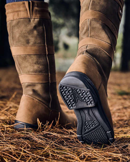 Dark Brown Coloured Dublin River Boots IV on grass background 