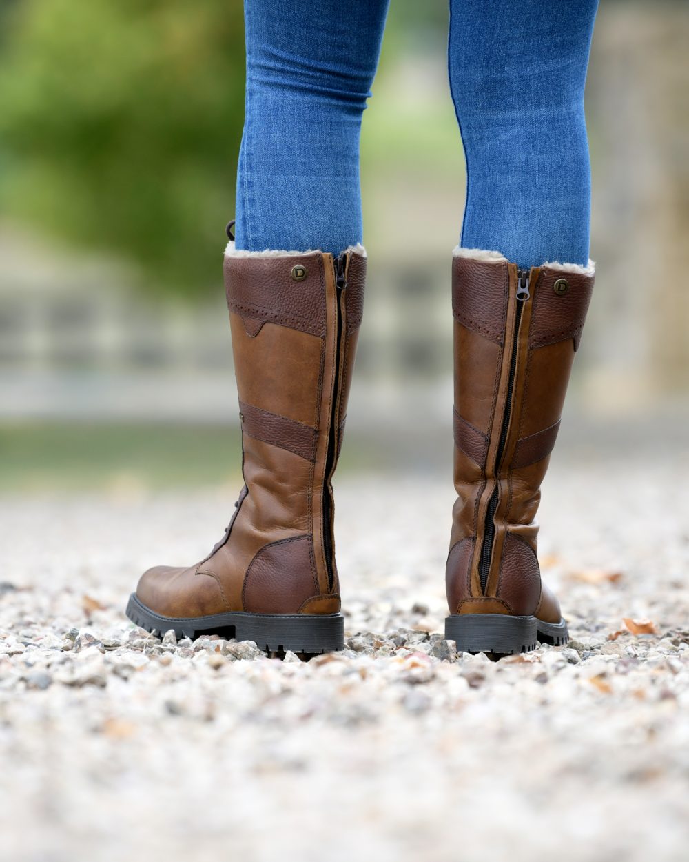 Brown Coloured Dublin Yukon Boots on blurry background 