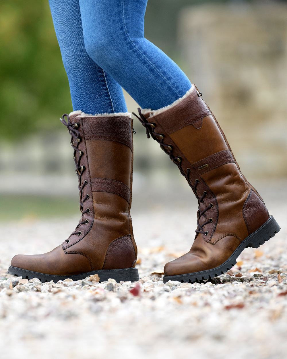 Brown Coloured Dublin Yukon Boots on blurry background 