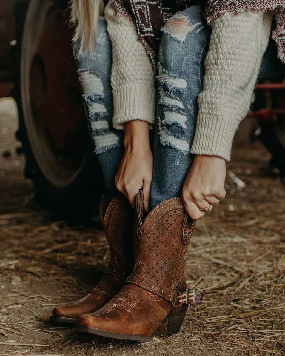 Bomber Brown coloured Durango Crush Shortie Boots on hay background 