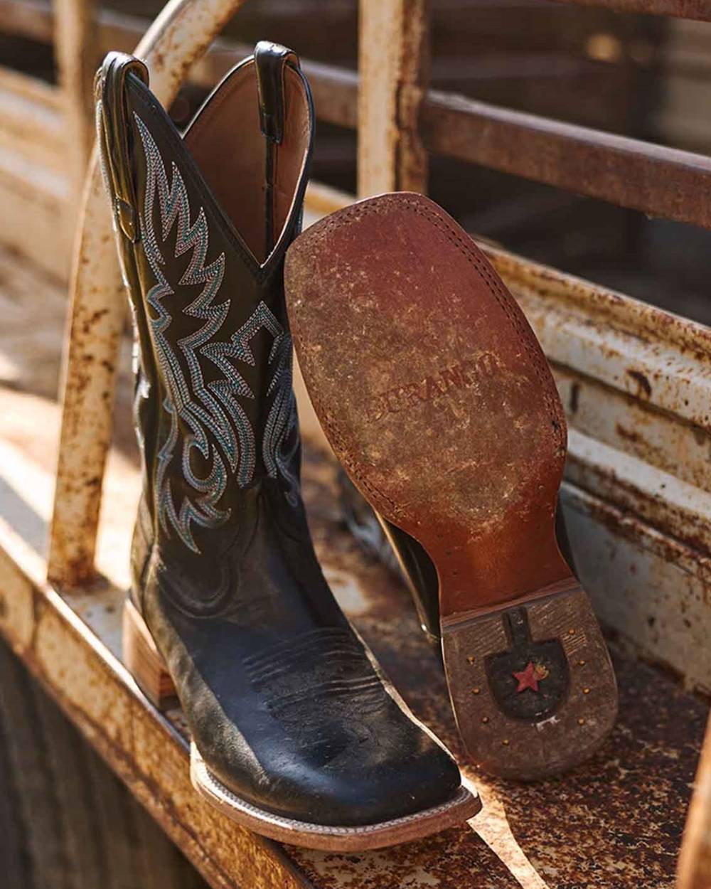 Black coloured Durango Mens Arena Pro Elite Western Boots on outdoor background 
