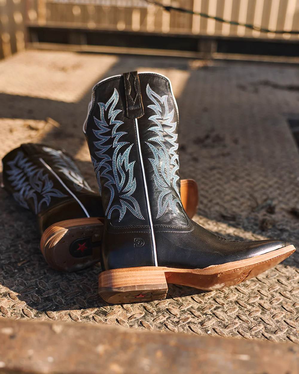 Black coloured Durango Mens Arena Pro Elite Western Boots on outdoor background 