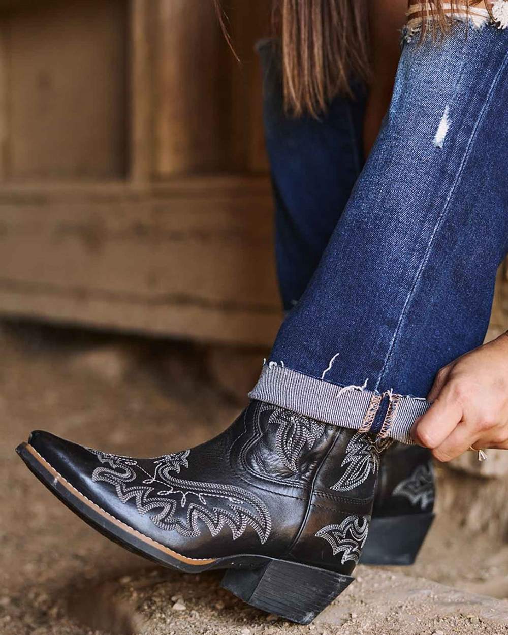 Polished Black Onyx coloured Durango Womens Shyloh Pony Boots on outdoor background 