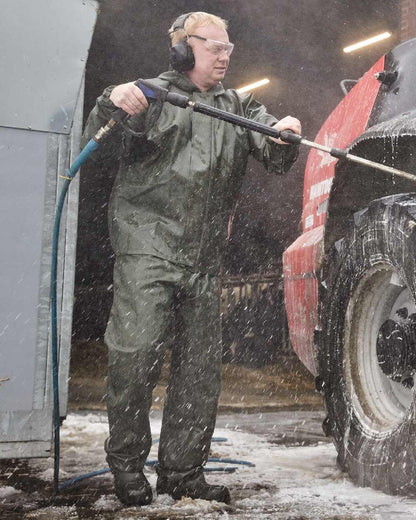 Olive Coloured Elka Light Jacket on construction background 