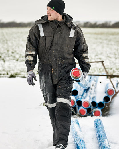 Grey Black Coloured Elka Mens Working Xtreme Winter Thermal Coverall on snow background 