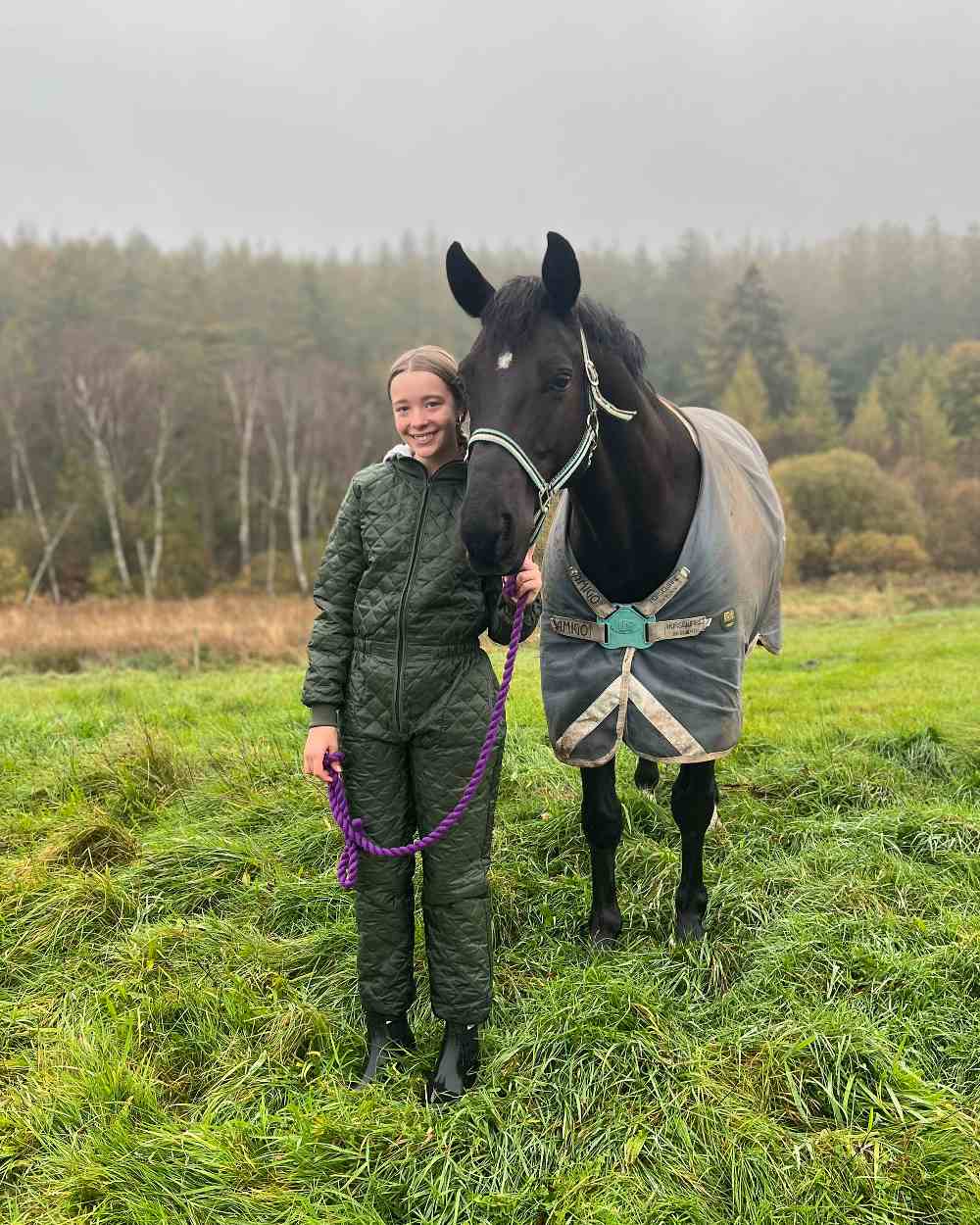 Olive Coloured Elka Womens Thermal Coverall on forest background 