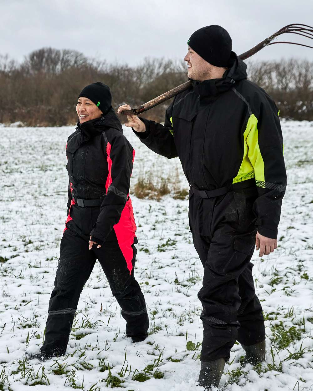 Black Red Coloured Elka Womens Working Xtreme Winter Thermal Coverall With Recycled Padding on snow background 